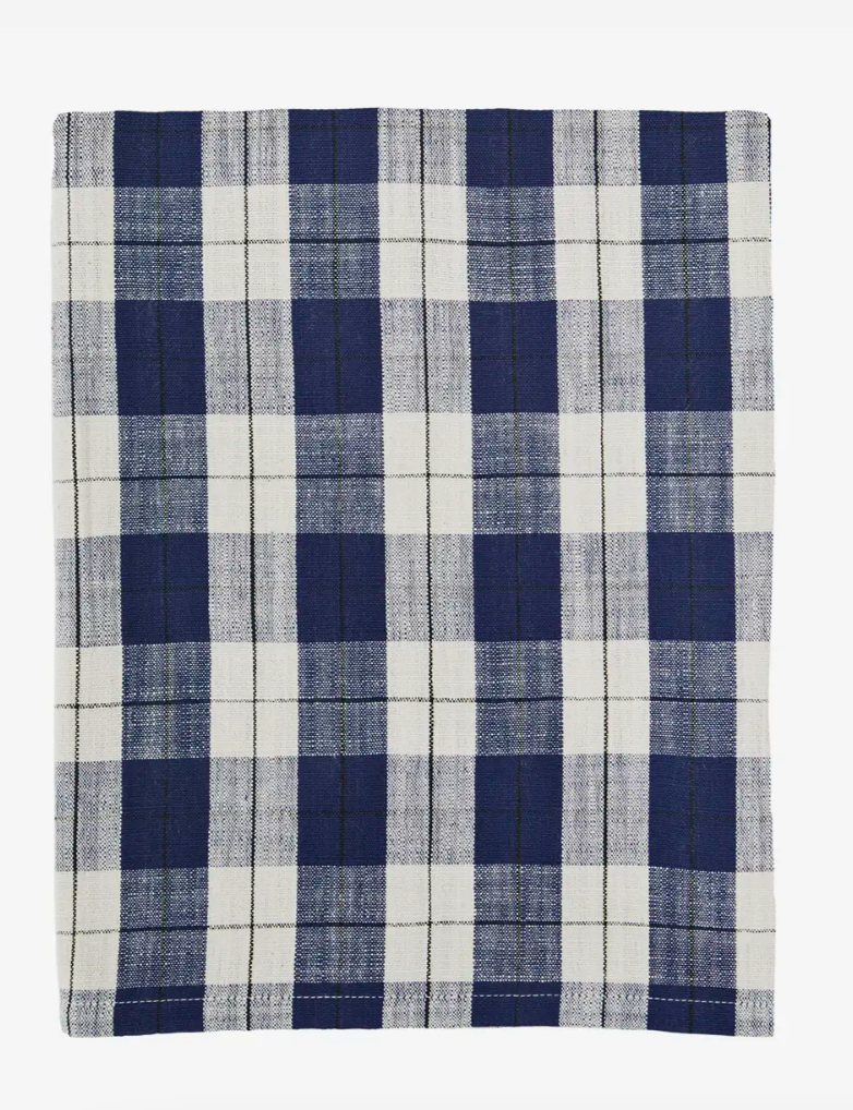 Navy and white checkered fabric on a white background