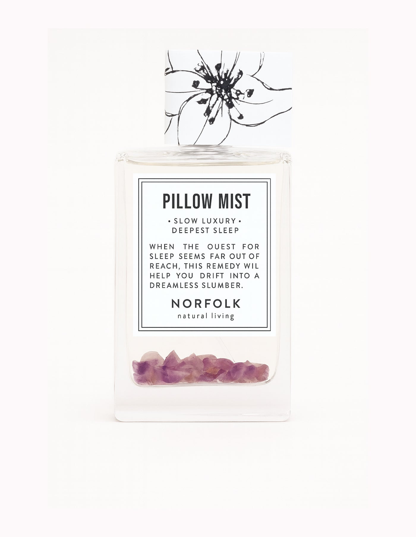 Pillow mist product with label and decorative elements on a white background