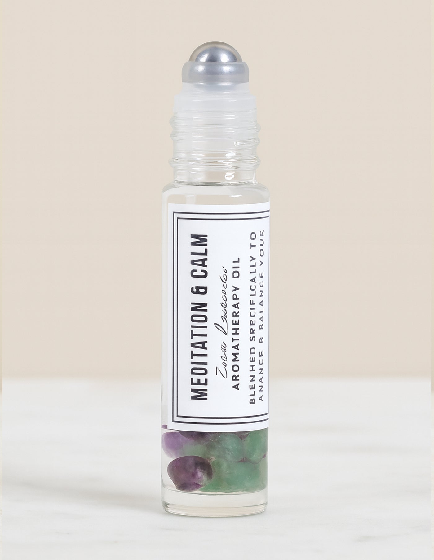 Roll-on bottle labeled 'Meditation & Calm' with a white background