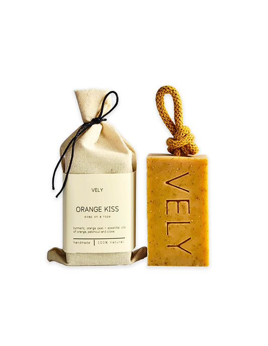 Vely Orange Kiss soap bar and packaging on a white background